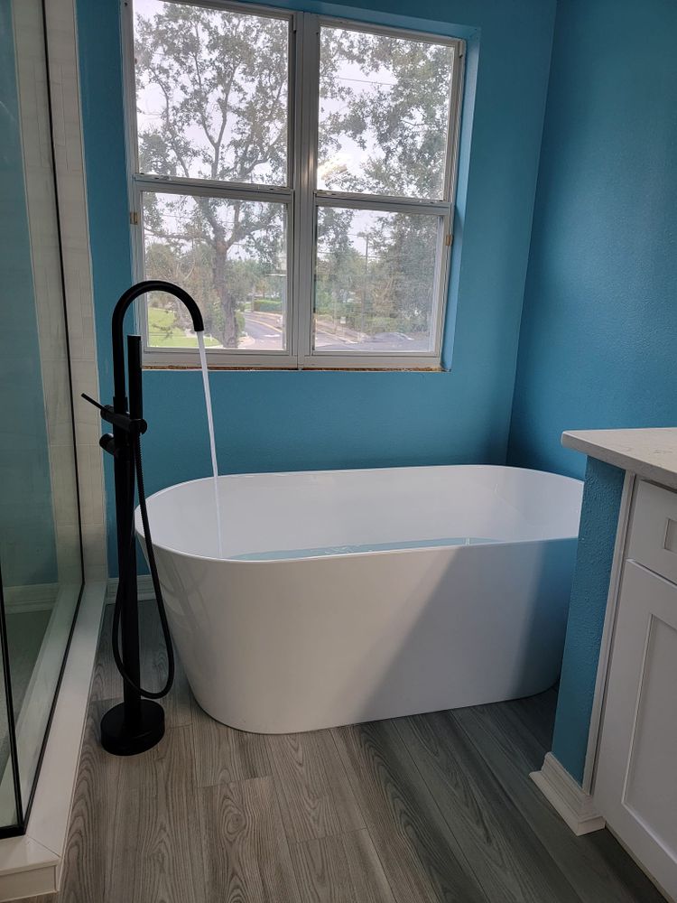 Transform your bathroom into a modern oasis with our expert renovation services. We combine top-quality materials and skilled craftsmanship to create stylish, functional spaces tailored to your needs and preferences. for Zion Remodeling & Construction in Gainesville, FL