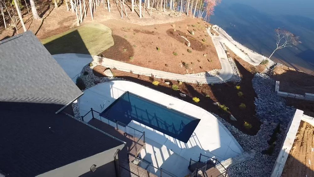 Transform your backyard with our Custom Pool Construction service, offering personalized designs, expert craftsmanship, and seamless installation to create the perfect oasis tailored to your unique style and preferences. for ZRS Pools and Construction in Granite Falls, NC