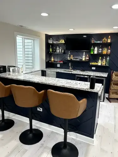 Transform your basement into a stylish and functional living space with our expert basement renovation service. Increase the value of your home while creating a cozy and inviting new area for relaxation. for Paynes Custom Builders Inc in Aurora, IL