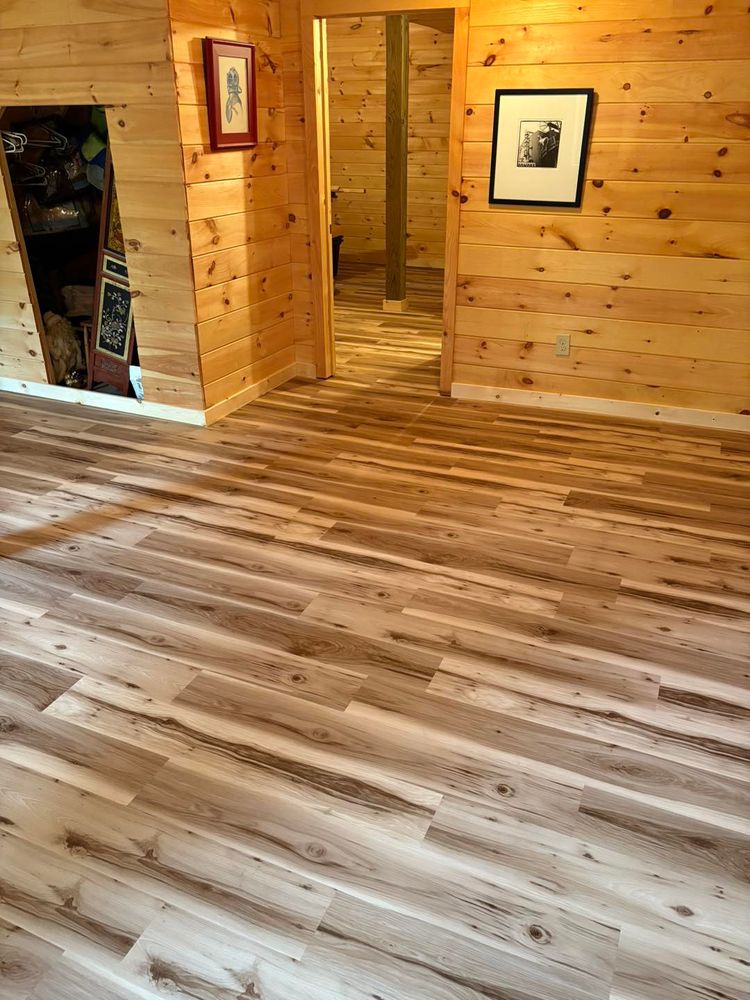 Our expert flooring installation service guarantees precision and quality, transforming your home's ambiance with a variety of stylish options to fit your taste and enhance the durability of your floors. for Jones Home Repair in Spruce Pine, NC