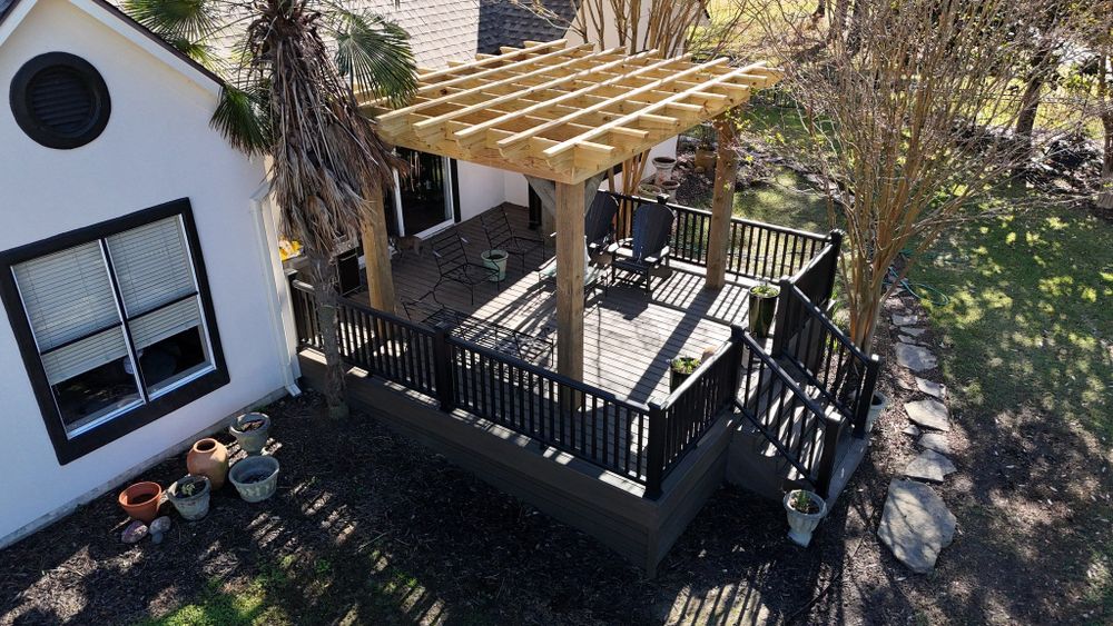 Enhance your outdoor space with our durable and stylish composite decking, offering low-maintenance beauty, weather resistance, and a safe environment for family gatherings in any season. Transform your backyard effortlessly. for Roberson Construction in Jackson, MS