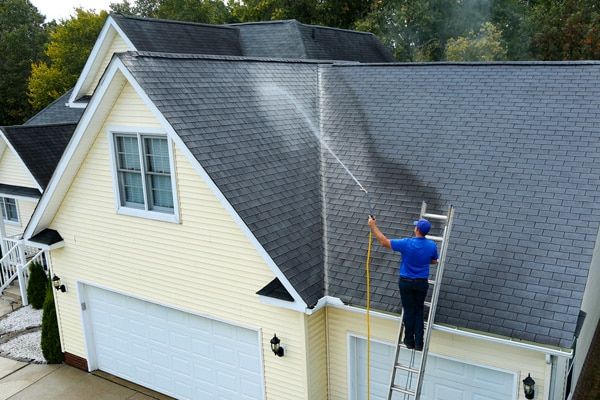 Our roof cleaning service safely removes dirt, moss, and algae using gentle techniques to protect your shingles, enhancing curb appeal and extending your roof's lifespan without causing damage. for Blackfin Pro Wash LLC in Houma, LA