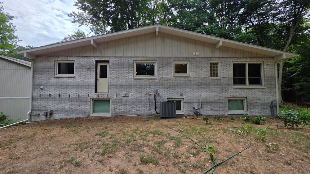 Transform your home's exterior with our Brick Lime Wash service, adding a rustic charm and timeless elegance to brick surfaces while providing protection against the elements for lasting beauty. for West Michigan Paint Pros LLC in Grand Rapids, MI