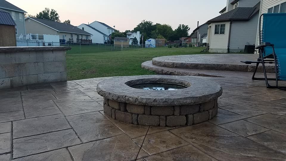 Elevate your outdoor living space with our expert Patio Design & Installation service. Our team will transform your backyard into a stylish and functional area for relaxing and entertaining guests. for Wes The Concrete Guy in Elmore,  OH