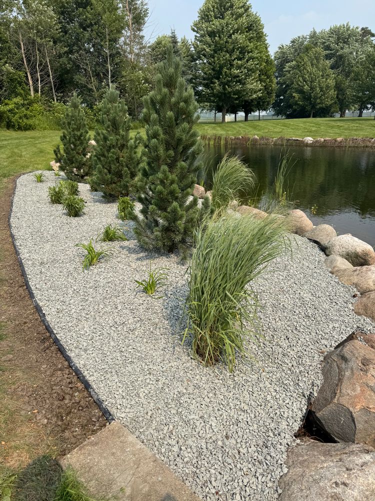 Transform your outdoor space with our professional Landscape Installation service. We design and install customized landscapes, incorporating plants, hardscapes, and water features to enhance beauty and functionality while increasing your property's value. for Wurm Lawn and Landscape in Maple Lake, MN