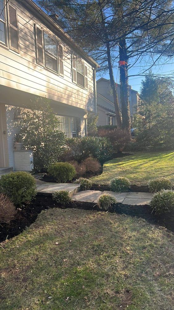 Our Patio Design & Construction service offers expert design and installation of beautiful, functional outdoor spaces perfect for entertaining or relaxing. Enhance your home with a custom patio today! for Woody's Tree and Landscaping in Fredericksburg, VA