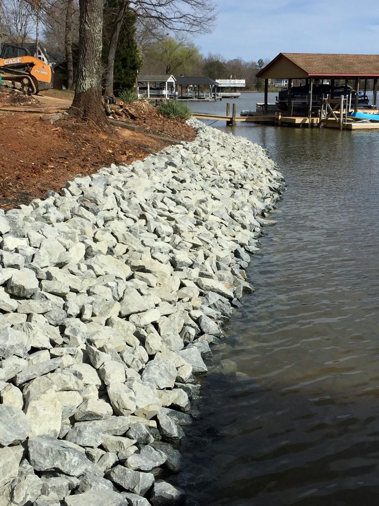 Our experienced team designs and installs durable riprap for erosion control along shorelines, creating a long-lasting barrier against water damage while enhancing the aesthetics of your property. for Lanier Excavating LLC in Bedford County, VA