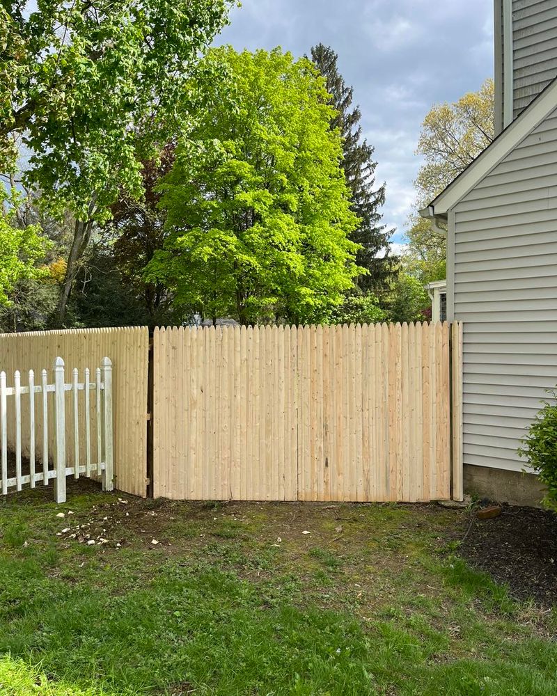 Explore our Fencing Solutions service to enhance your property's security and aesthetics with high-quality fencing options expertly installed by our experienced team, ensuring durability and style for your home. for Walton Property Services in Hyde Park , NY