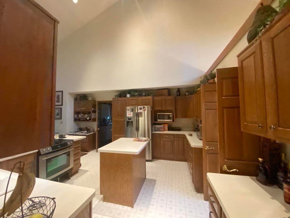 Revitalize your kitchen with our expert Cabinet Refinishing service. Our team transforms worn surfaces into stunning, like-new finishes, enhancing beauty and functionality while increasing your home's value effortlessly. for Ackermann Painting Company in Cincinnati, OH