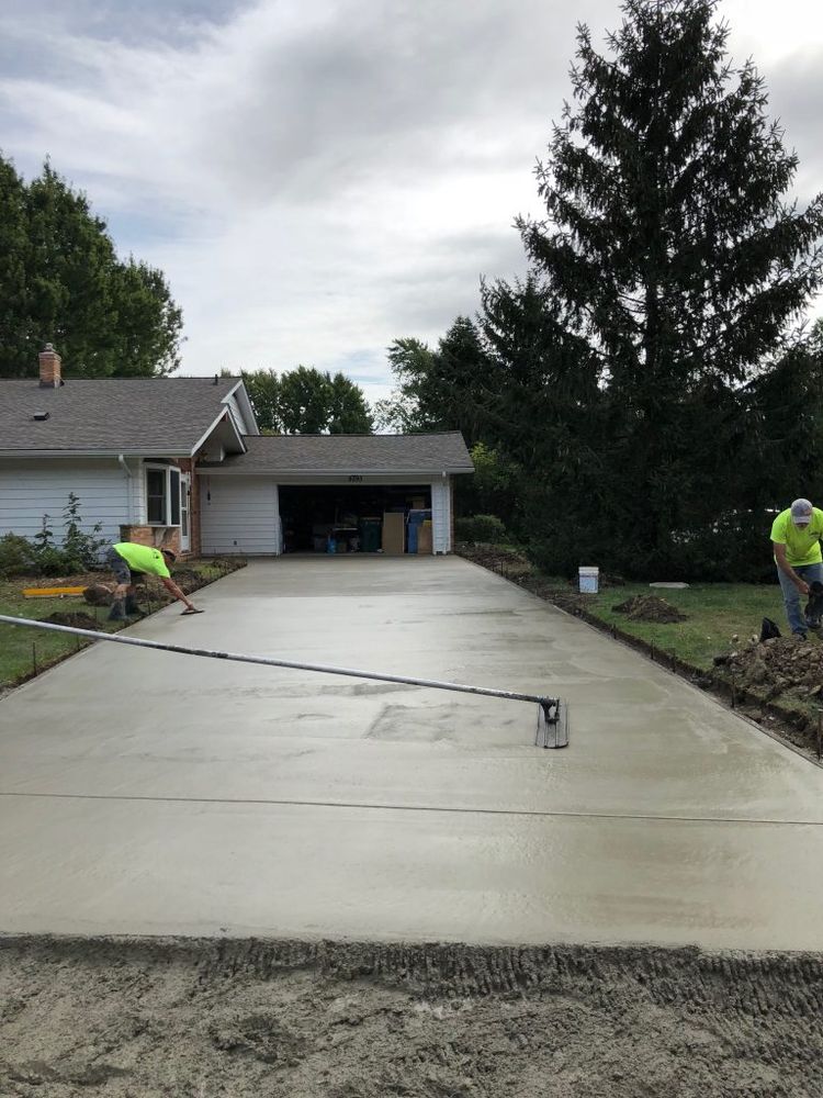 Our concrete service offers durable and stylish solutions for patios, driveways, and walkways, enhancing your home's curb appeal with expertly crafted installations that withstand weather elements while adding value to your property. for Outdoor Assassins LLC in Hendersonville, NC