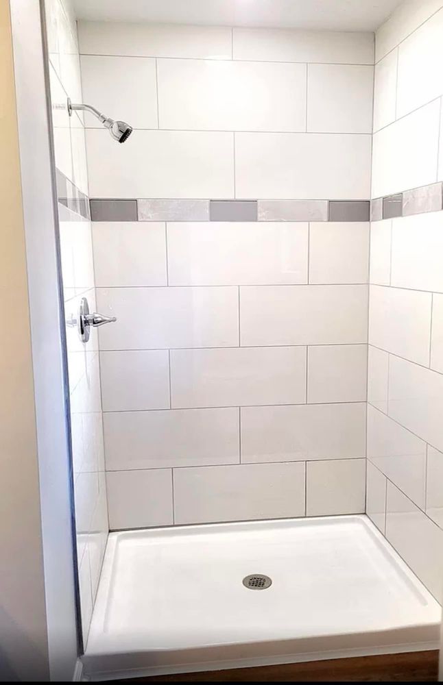 Enhance your home's beauty with our expert tile work services. We offer meticulous installation and design for kitchens and bathrooms to transform your space into a stunning showcase of style and durability. for LMB Construction in Dallas, GA