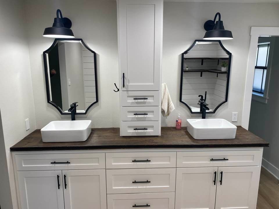 Enhance the beauty of your kitchen or bathroom cabinets with our professional staining service. Our expert carpenters will transform your space with rich, long-lasting color and protection. for Creek Wood Construction LLC in Humble, TX