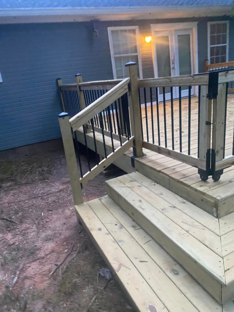 Transform your outdoor living space with our expert Deck and Patio Construction service. We design and build customized decks and patios to enhance the beauty and functionality of your home exterior. for For My Kids Construction and Cleaning LLC in Carrolton, GA