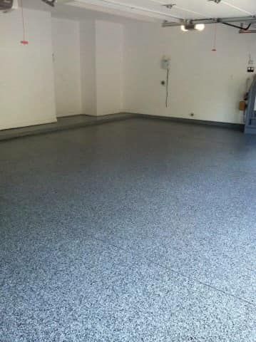 Transform your concrete floors with our durable and stylish epoxy coating. Enhance the look of your home while increasing durability and making maintenance a breeze with our professional epoxy floors service. for International Coatings Corp. in Howell, Michigan