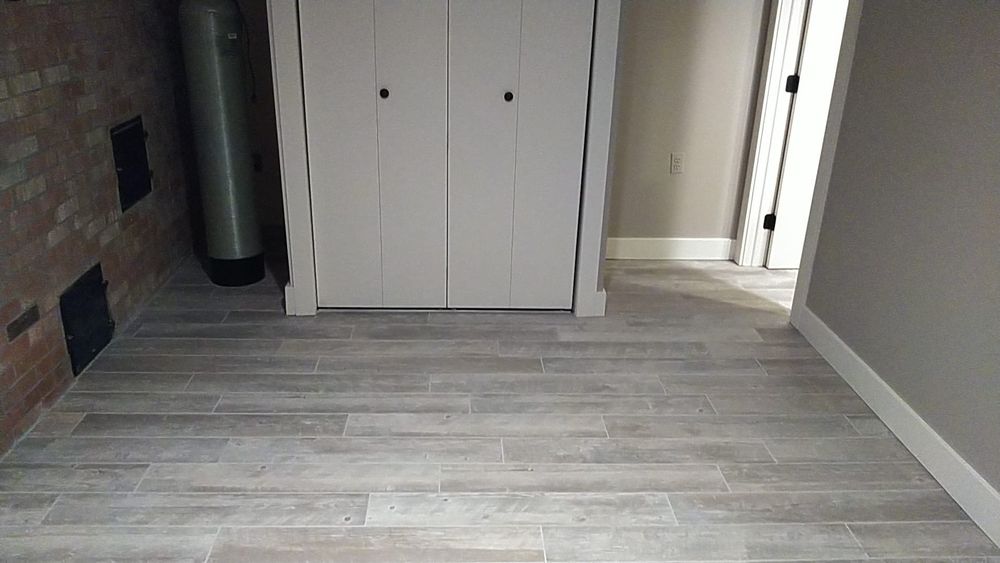 Our Flooring service offers a wide range of high-quality materials and expert installation to enhance the aesthetics and functionality of your home, transforming it into a stylish and comfortable space. for Russell's Renovations in Grand Rapids,  MI