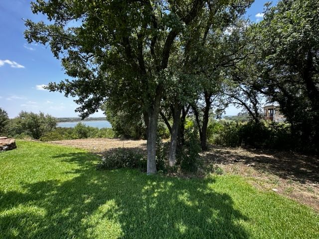 Our Forestry Mulching service provides efficient mulch installation, transforming dense brush and trees into eco-friendly ground cover that enriches soil health, prevents erosion, and beautifies your landscape with minimal environmental impact. for 512 Land Clearing in Blanco County, TX