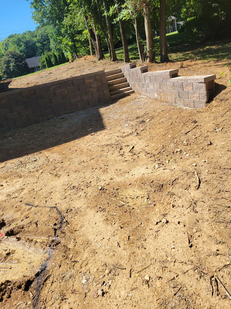 Enhance your landscape's stability and beauty with our professional retaining wall construction service, expertly crafted to prevent soil erosion while adding functional and aesthetic appeal to your outdoor space. for Mr. Concrete Outdoor Services LLC in Nashville, TN