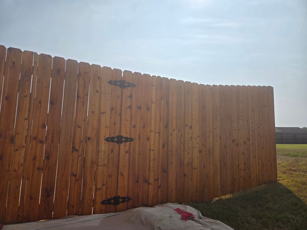 Fence staining for Patriot Fence  in Oakland, TN