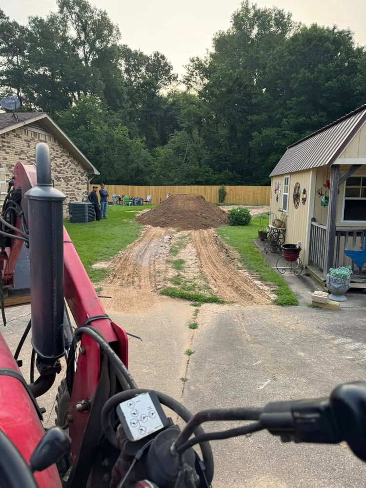 Enhance your landscape with our expert Retaining Wall Construction service, providing sturdy and attractive solutions to prevent soil erosion while complementing your property's natural beauty. Trust us for durable and aesthetic results. for Sanchez Odd Jobs in Carthage, TX