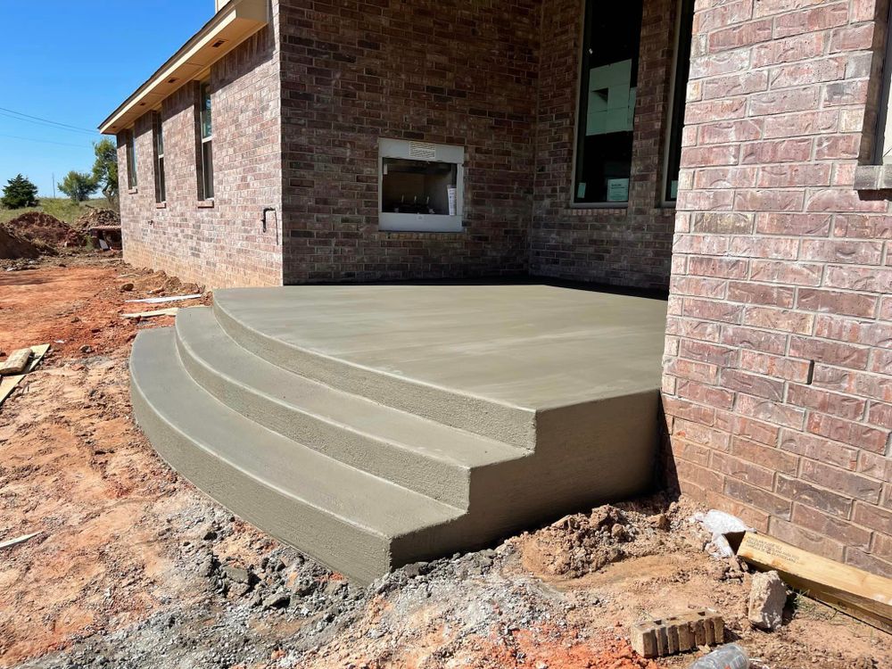 Our Stair Design & Installation service offers homeowners the opportunity to enhance their property with durable and visually appealing concrete stairs tailored to fit their unique aesthetic preferences and functional needs. for Concrete Cervantes in Oklahoma City, OK