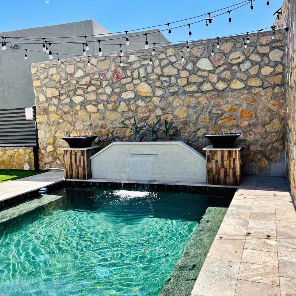 Our Swimming Pools service offers homeowners the opportunity to transform their outdoor space into a stunning oasis, providing relaxation and enjoyment for family and friends. for Oasis Landscaping LLC  in El Paso, TX