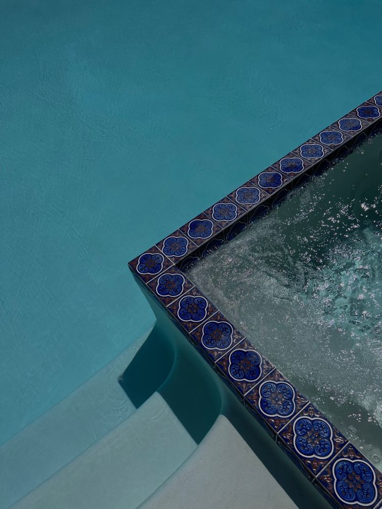 Enhance your pool's aesthetic and functionality with our Tile and Coping service, offering durable materials expertly crafted to create elegant, seamless transitions between waterline tiles and pool edges. for Montgomery Custom Pools in Montgomery, TX