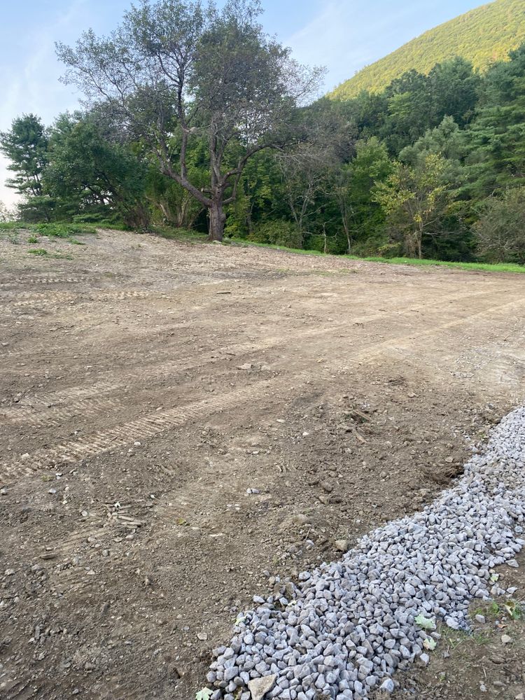 Our Land Clearing & Demolition service provides efficient, safe removal of unwanted structures and debris, preparing your property for new projects while maintaining environmental responsibility and enhancing site aesthetics for homeowners’ peace of mind. for A & J Excavation inc. in Central Bridge, NY