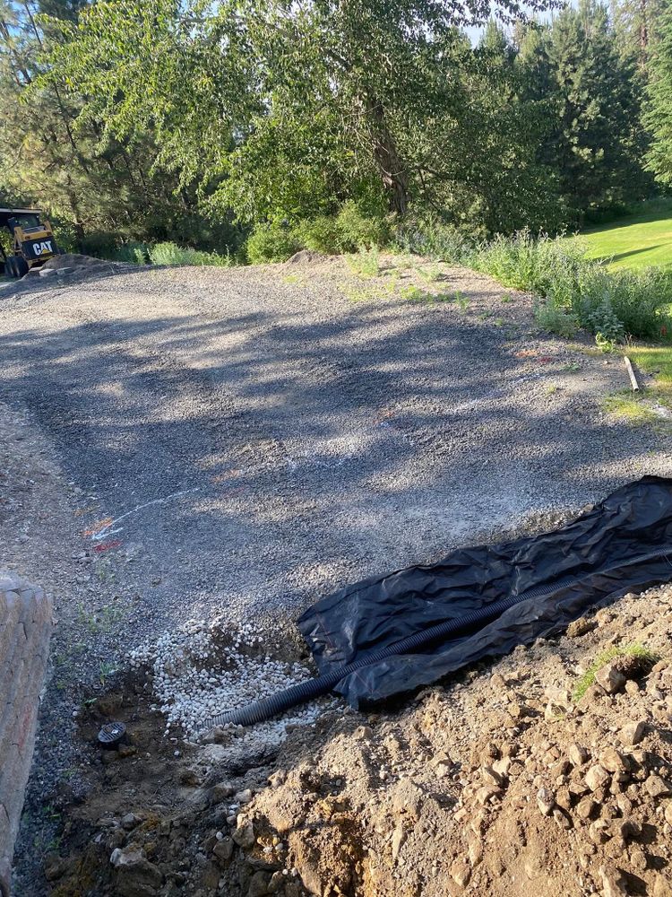 Our Roadbeds service ensures a stable and durable foundation for driveways or private roads, using precise excavation techniques and quality materials to enhance your property’s accessibility and longevity. for Arthur Construction in Deer Park, WA