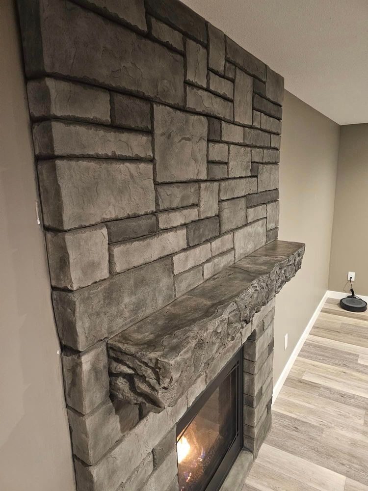 Interior fireplace & feature walls  for STAMPEDE Vertical Concrete in Isanti, Minnesota