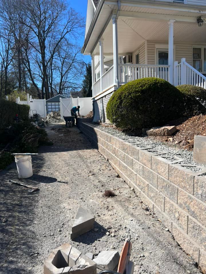 Our expert team specializes in constructing durable and visually appealing retaining walls to enhance your property's stability and aesthetic appeal, ensuring long-lasting support for your landscape design. for Fajardo construction&masory LLC in Morristown, NJ