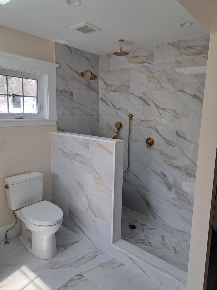 Our professional bathroom renovation service transforms outdated spaces into luxurious retreats with expert craftsmanship, quality materials, and personalized designs to enhance functionality and style for your home's ultimate comfort. for Hier Construction in Randolph, MA