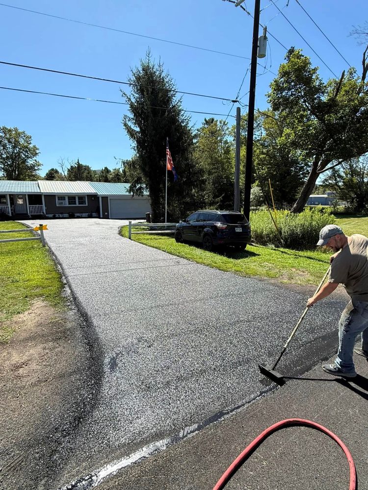 Our crack filling service seals pavement cracks before water causes costly damage, helping prevent potholes, extending asphalt life, improving curb appeal, and protecting your driveway or parking lot year-round. for Dibbles Asphalt Maintenance in Westernville, NY