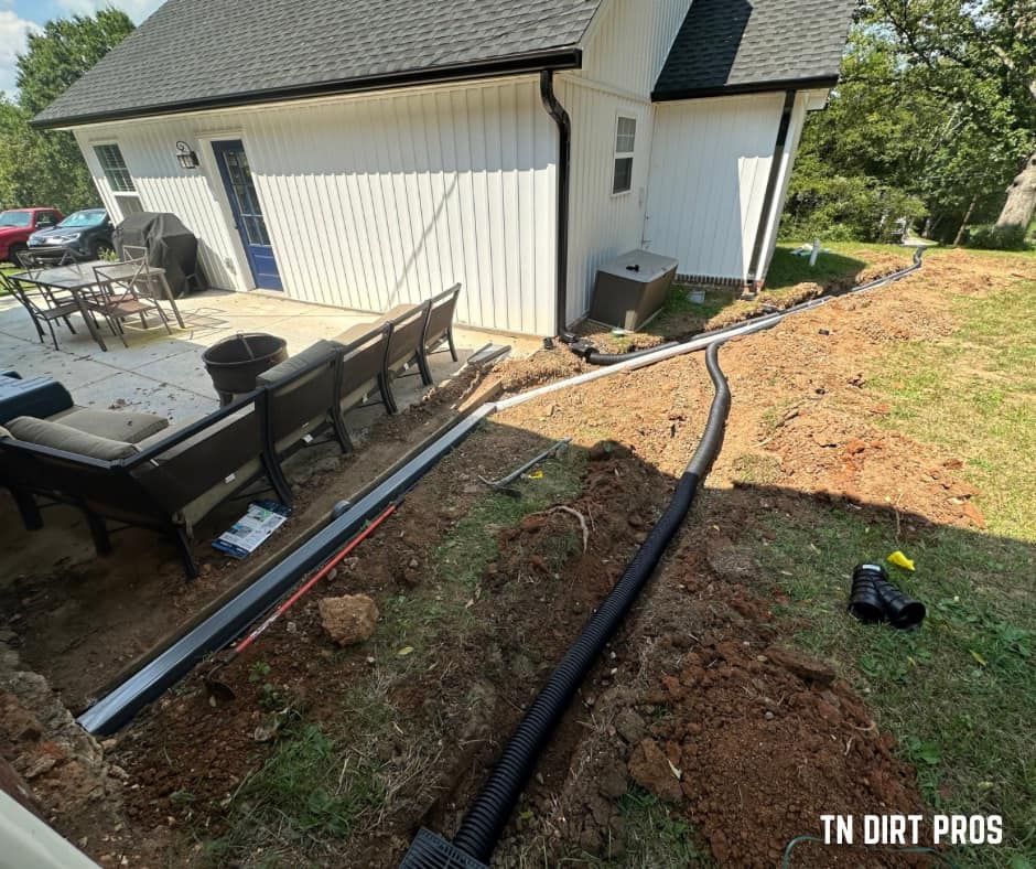 Our expert Drainage System Install & Repair service ensures your property remains safe and dry by effectively managing water flow, reducing erosion risks, and protecting your investment from potential landscape damage. for TN DIRT PROS in Cleveland, TN