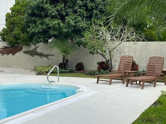 Our Pool Deck, Patio & Enclosures service offers professional power washing and cleaning solutions to homeowners looking to revitalize their outdoor spaces for optimal enjoyment and aesthetic appeal. for Foreshore Pressure Cleaning Services Inc in Holiday, FL