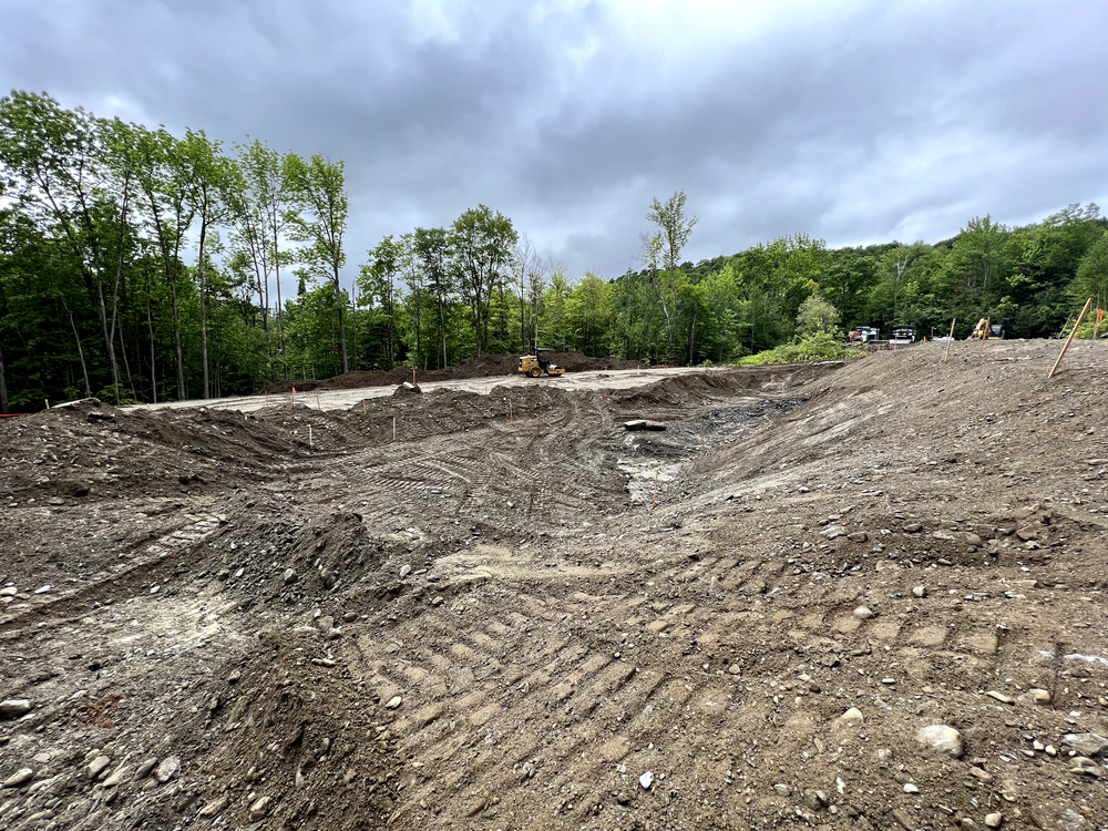 Carving a Pond into a Mountain Side for Andy Naylor Excavation in Stowe, VT