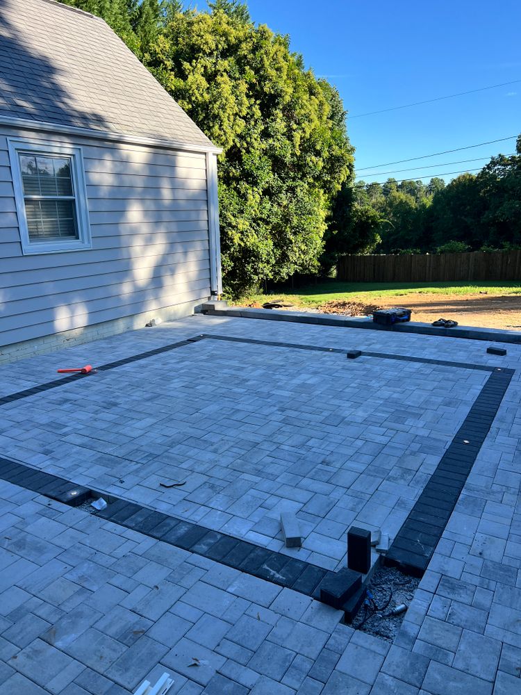 Enhance your outdoor space with our comprehensive landscaping services, specializing in retaining wall construction and patio design. Transform your yard into a beautiful, functional area that suits all your needs. for Massey Landscaping in Gastonia, NC