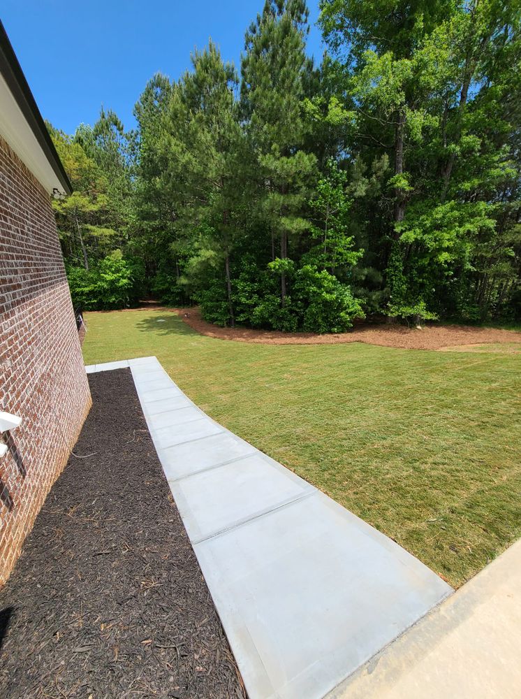 Enhance your home with our expert sidewalk installation service, providing durable, aesthetically pleasing concrete pathways designed to complement your exterior and ensure safety, longevity, and curb appeal for any property. for HAYS Property Services in Jefferson, GA