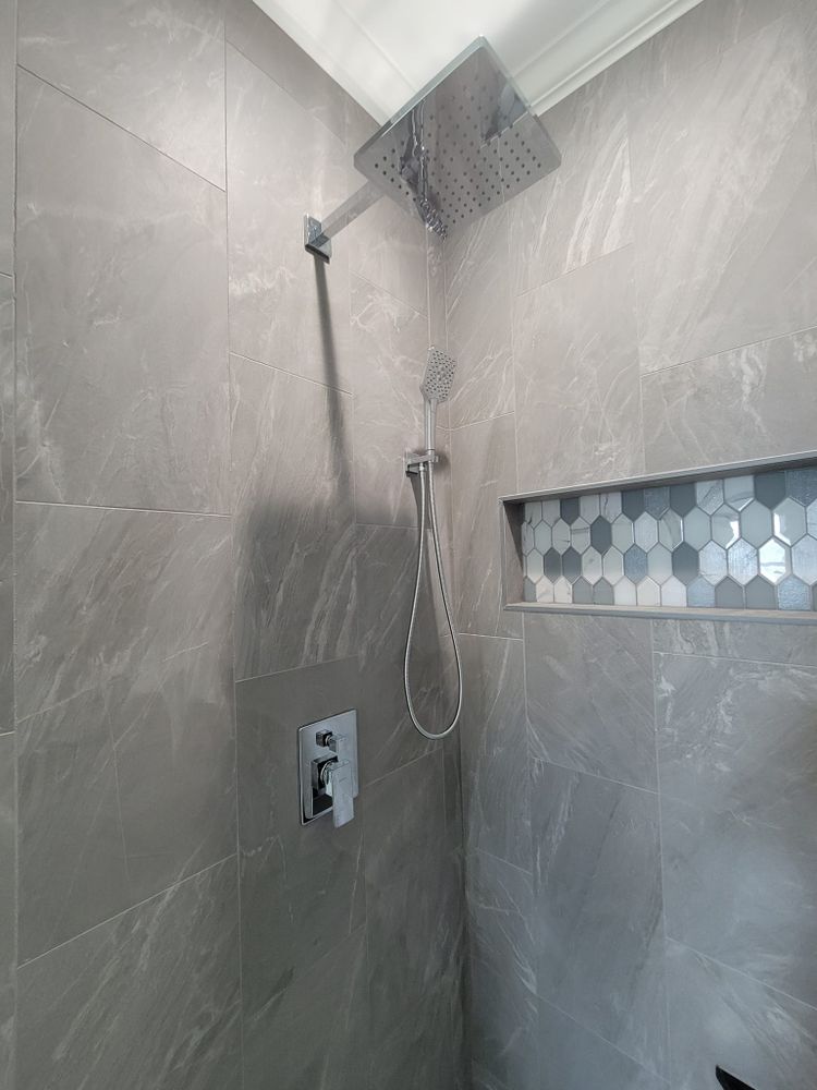 Our Custom Showers service offers homeowners a personalized and stylish solution for their bathroom renovation needs, ensuring a luxurious and functional space that meets their unique preferences. for GVL Renovations in Greenville, SC