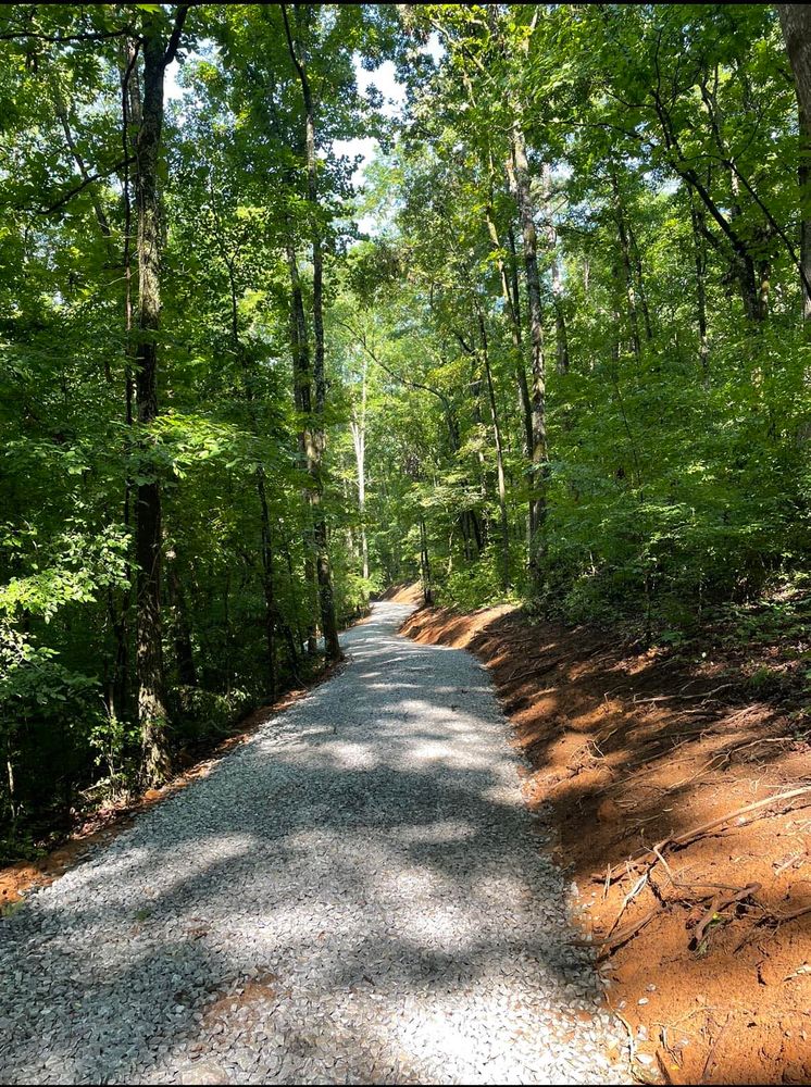 We offer professional grading services to ensure your property is level and prepared for construction, enhancing the efficiency and quality of any land clearing project you have planned. for Triple P Excavation in Atlanta, GA