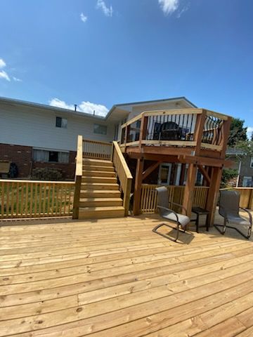 Enhance your outdoor living space with our expert deck & patio installation service, offering customized designs and quality craftsmanship to create the perfect setting for relaxation and entertaining in your backyard. for Reinhardt’s Remodeling in Wheelersburg, OH