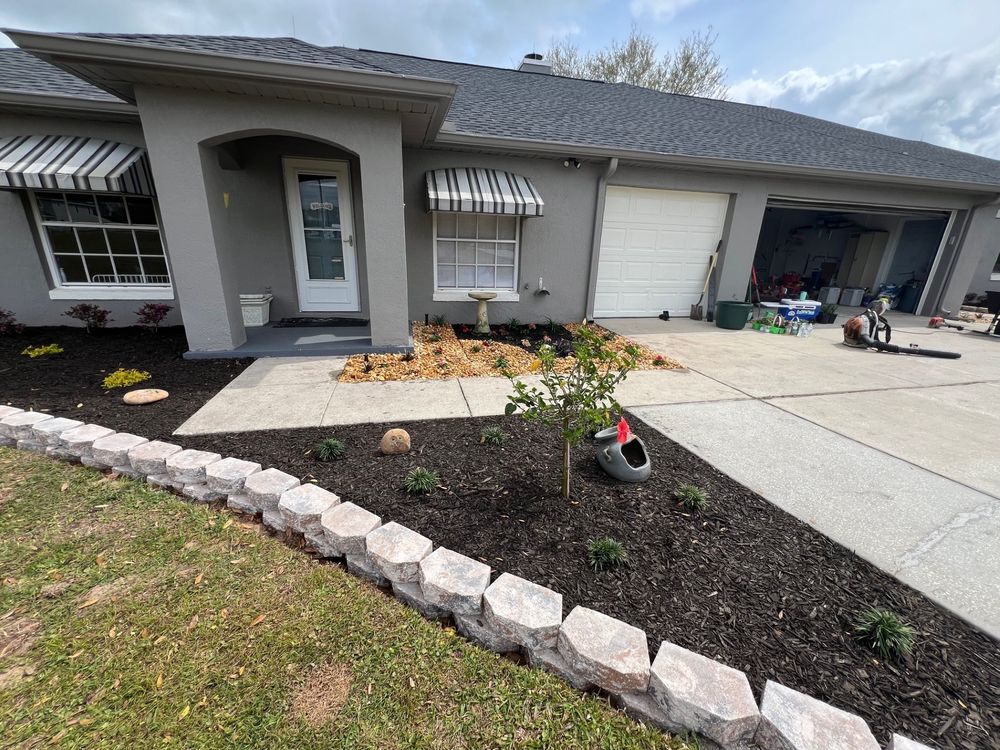 Landscape with retaining wall for Thurmond & Sons Landscaping  in Montverde, FL