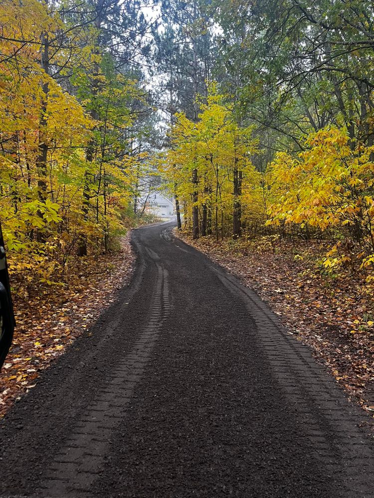 Our Roadbeds service provides expertly engineered, durable foundations for driveways and pathways, ensuring stability and longevity on your property with precise excavation techniques tailored to meet every homeowner's specific landscaping needs. for Accurate Excavating in Grand Rapids, MI