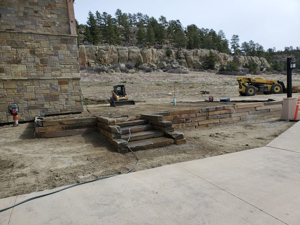 Our retaining wall construction service creates durable, attractive walls that prevent erosion, manage drainage, and stabilize your property’s landscape while improving function, safety, and curb appeal for years. for Bull Mountain Stoneworks & Excavation in Kalispell, MT
