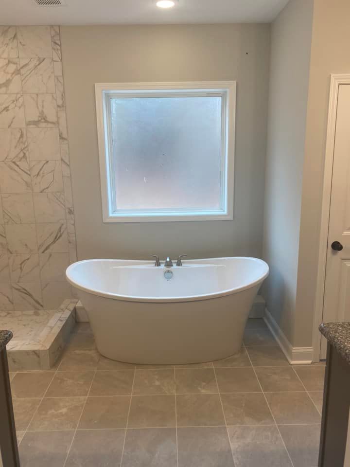 Transform your bathroom into a modern, functional space with our expert renovation services. We customize designs to fit your style and budget, ensuring quality craftsmanship and exceptional customer satisfaction every step of the way. for Strickland Custom Homes in Raeford, NC