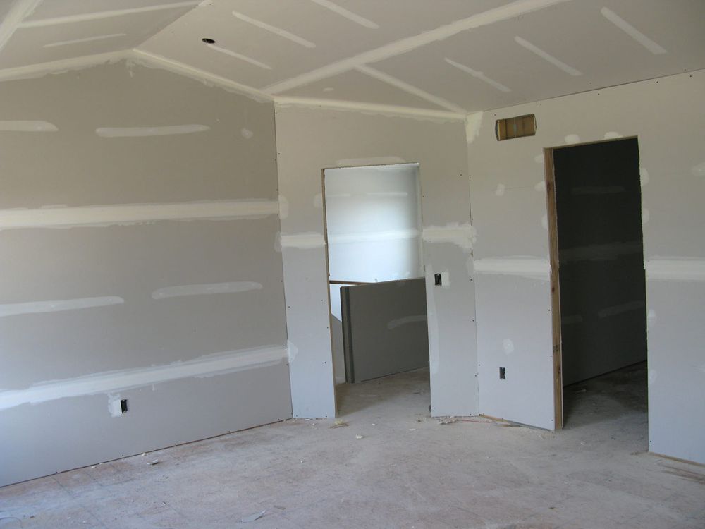 Our drywall and plastering service repairs cracks, smooths damaged walls, and creates a flawless surface ready for paint, helping homeowners improve appearance, durability, and value throughout every room. for Servicolor Painting in Macon, GA