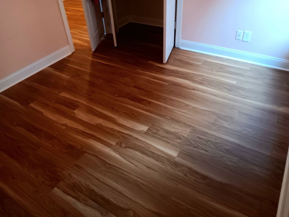 Transform your home with our expert flooring services, offering a wide range of materials and styles to suit any taste. Enjoy professional installation and exceptional durability for long-lasting beauty underfoot. for Iron Man Construction in Charlotte, NC