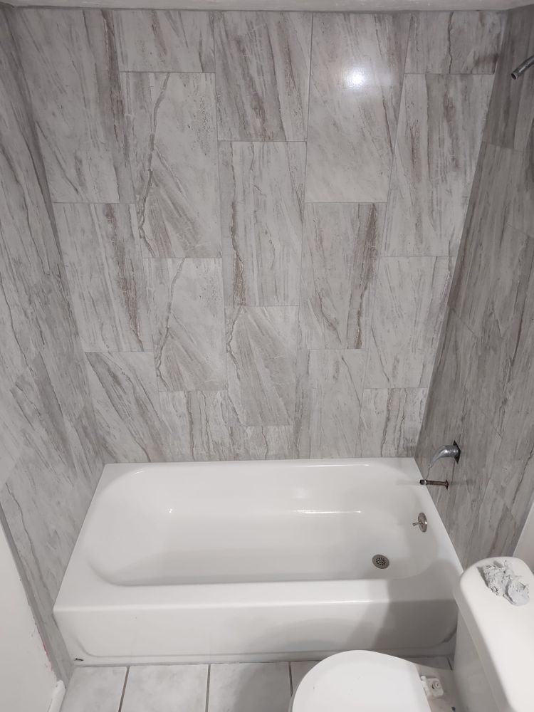 Transform your bathroom with our Custom Showers service. Our expert team specializes in shower remodel solutions tailored to your style and needs for a luxurious and functional upgrade. for Brennan Custom Tiling, flooring and more in Gainesville, FL