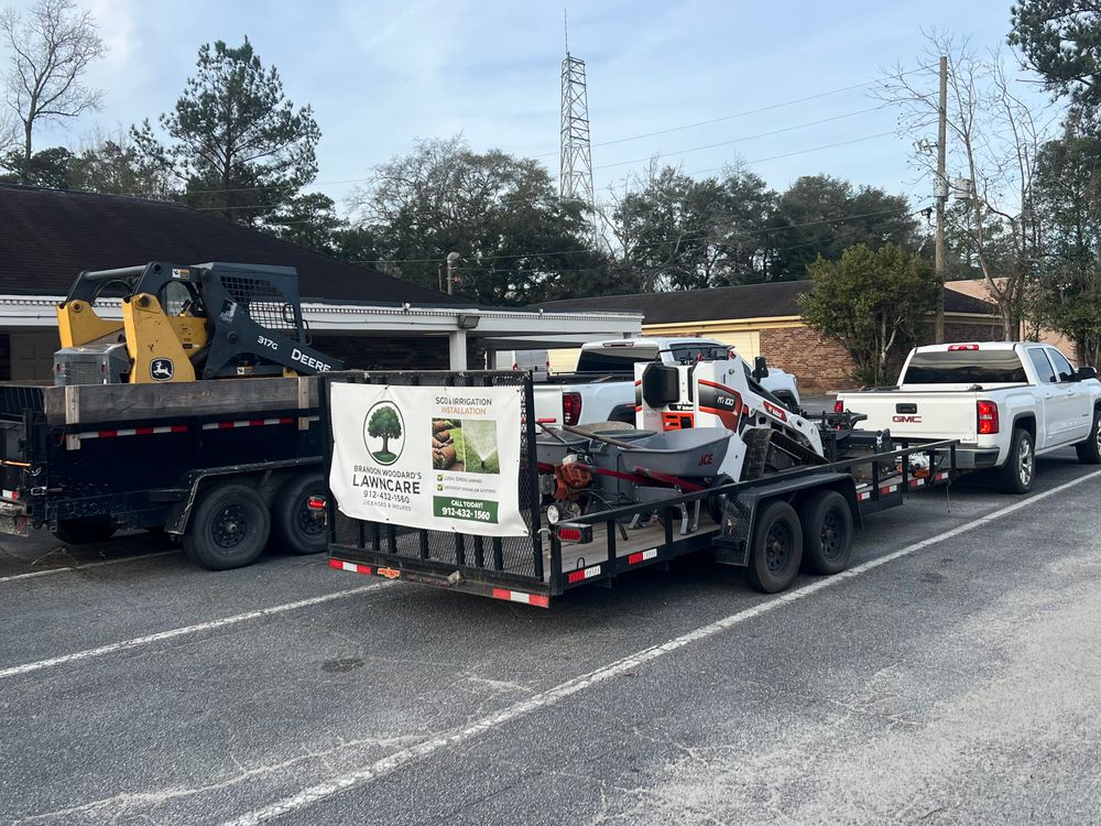 Brandon Woodard’s Lawncare team in Ludowici, GA - people or person