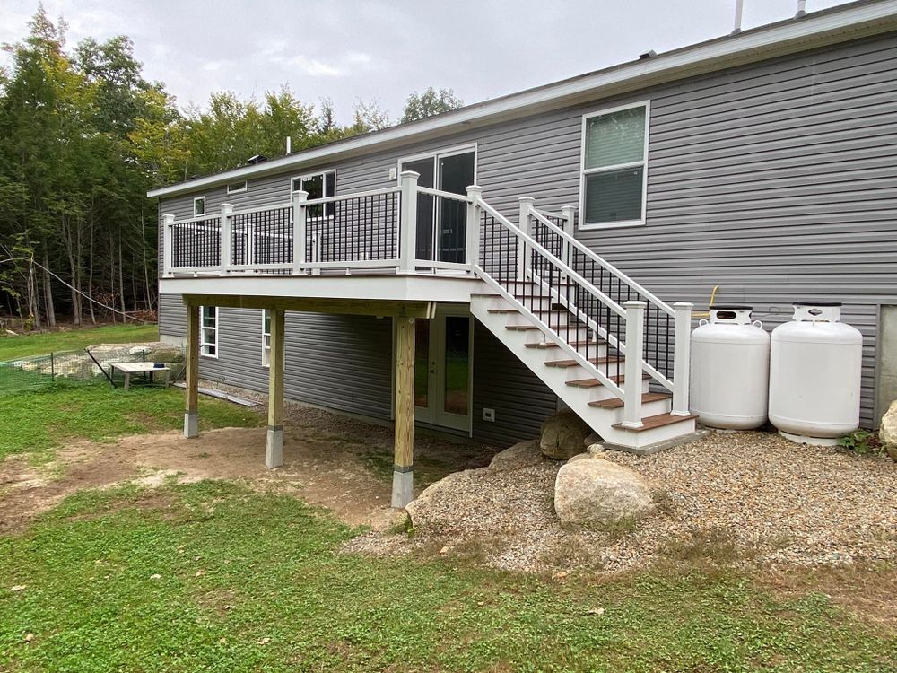 Enhance your home’s elegance and safety with our expert Railings service. Our skilled team seamlessly integrates stunning designs, complementing tiled interiors for a harmonious blend of beauty and functionality. for Eagle Services LLC in Casco, ME