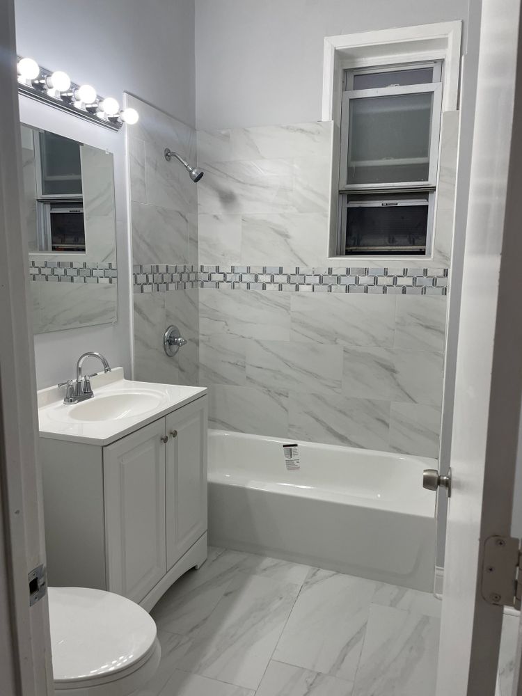 Our Bathroom Renovation service offers a complete transformation of your existing space, providing updated fixtures, improved layout design, and premium materials to create a beautiful and functional new bathroom for your home. for 3:16 Roofing & Construction  in Chicago, IL